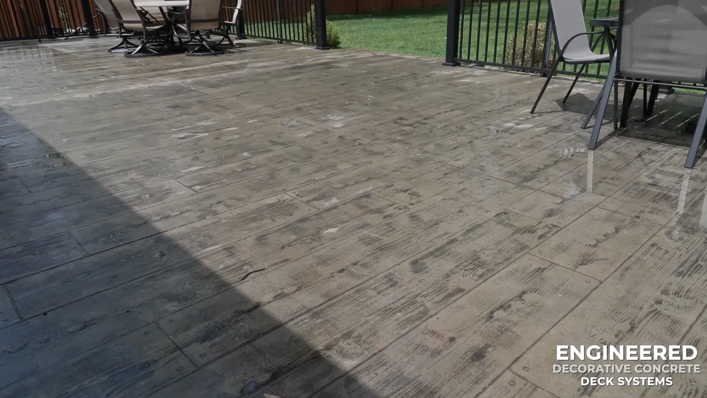 Finished decorative concrete deck with a wood-plank texture